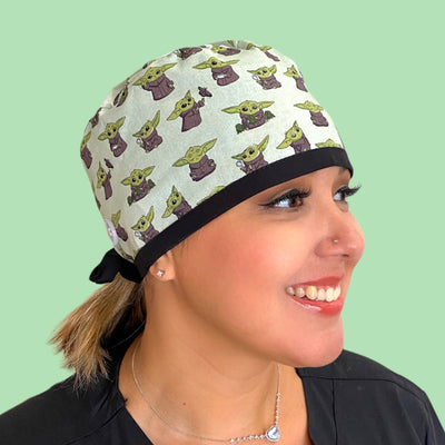 the child baby yoda Classic: A unisex style for anyone who prefers a sportier, more form-fitting look. 100% Cotton. Available with a satin-lined interior which helps protect your hair against frizz and breakage